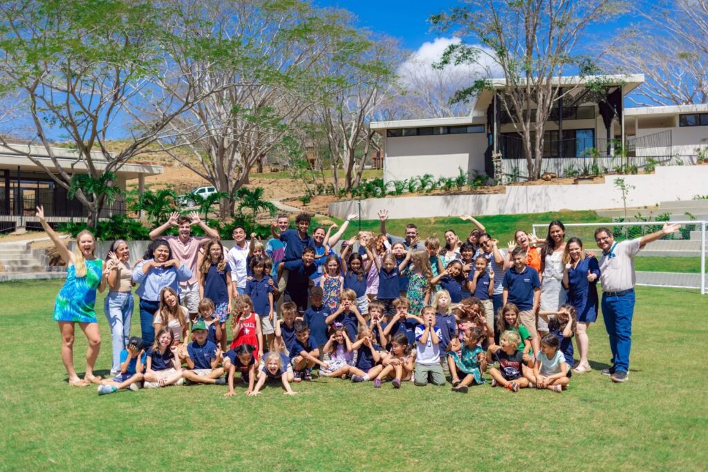 Students and teachers of Tambran International School on their campus in El Encanto del Sur